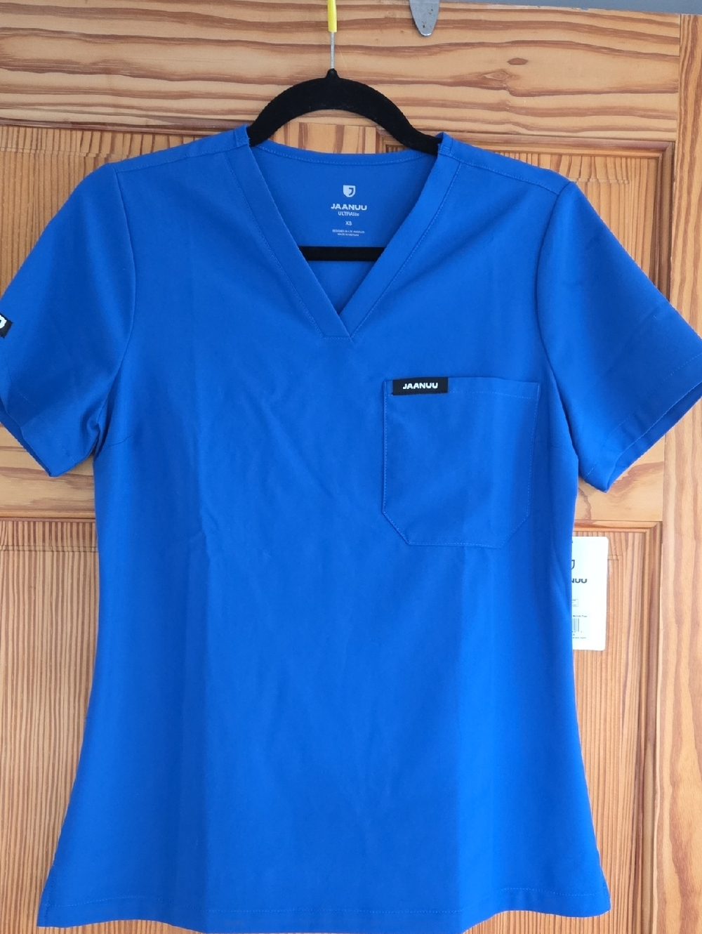 Jaanuu Women's V-Neck Scrub Top - Blue